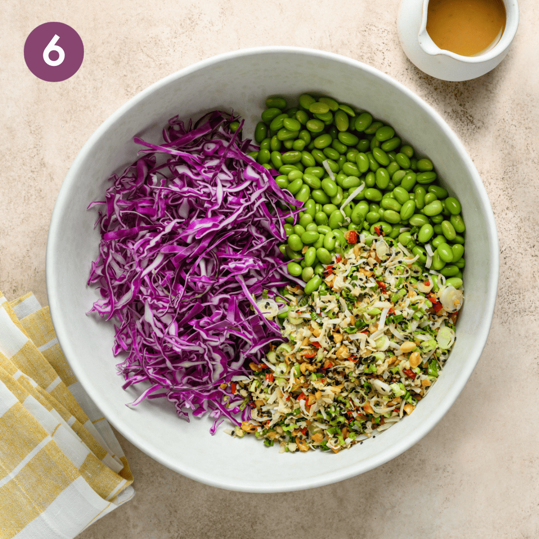 edamame, cabbage and skillet mixture in in a bowl.