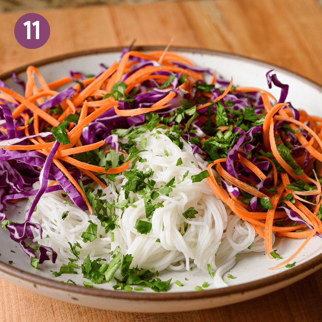 cilantro added to noodle bowl.