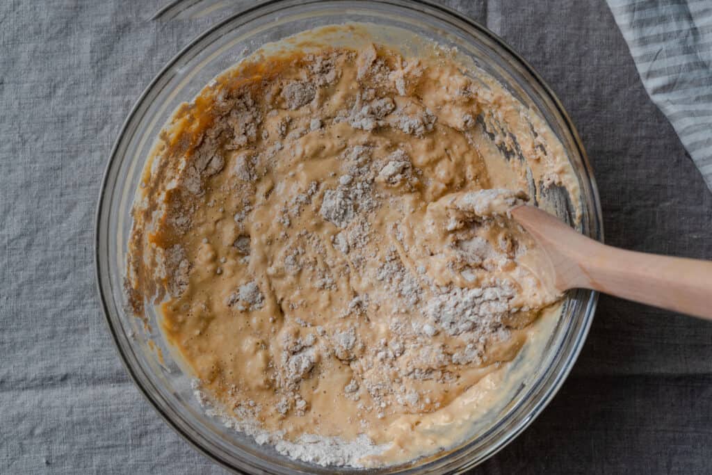 melted vegan butter in a bowl of buttermilk