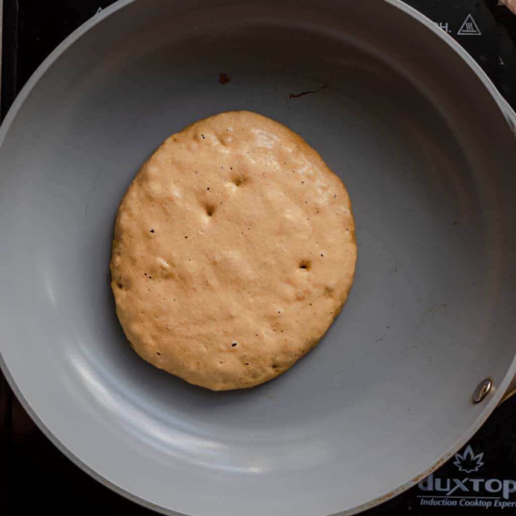 bubbles forming on pancake in skillet