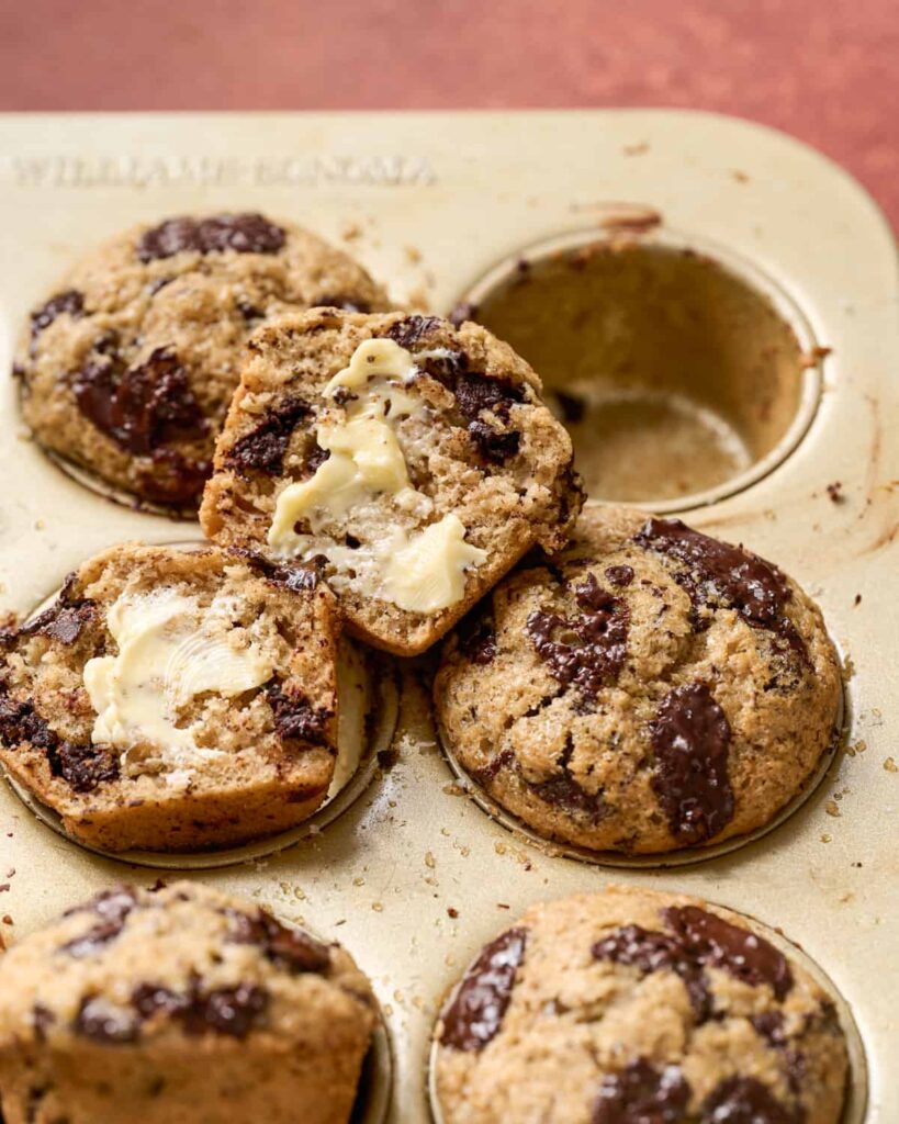 chocolate chips added to top of batter in muffin tin.