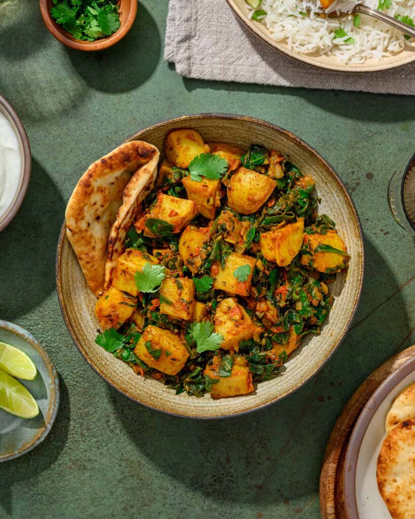 garam masala, cilantro and lemon juice added to the saag aloo.